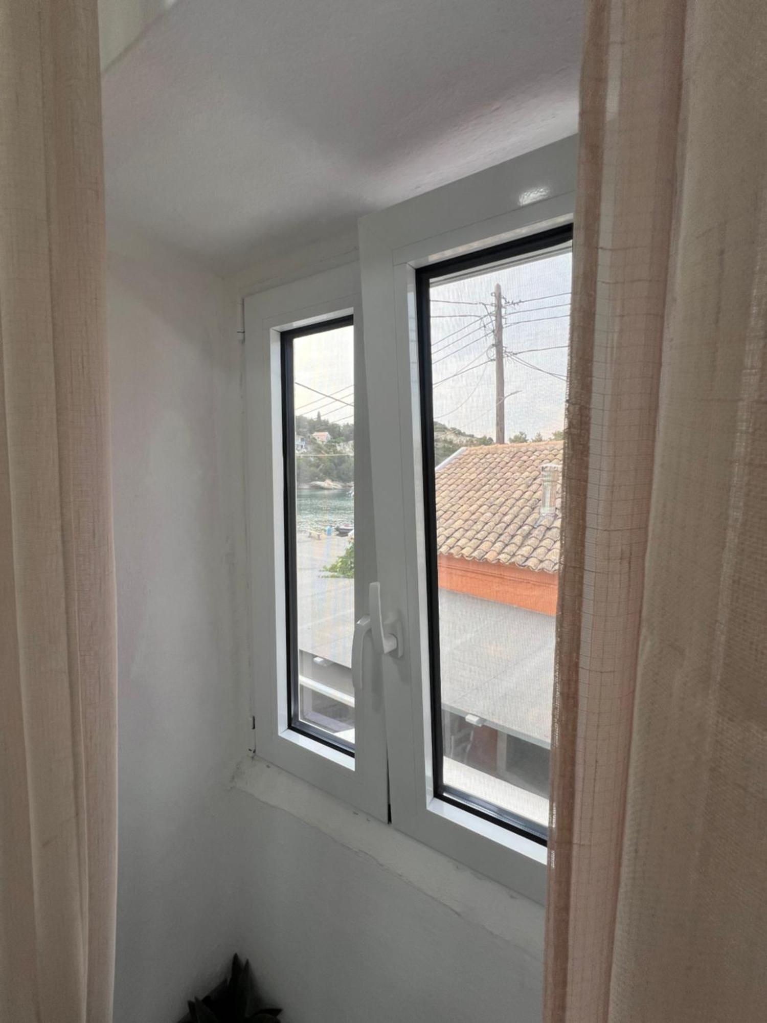 Tolos Budget Rooms Loggos Longos  Bilik gambar
